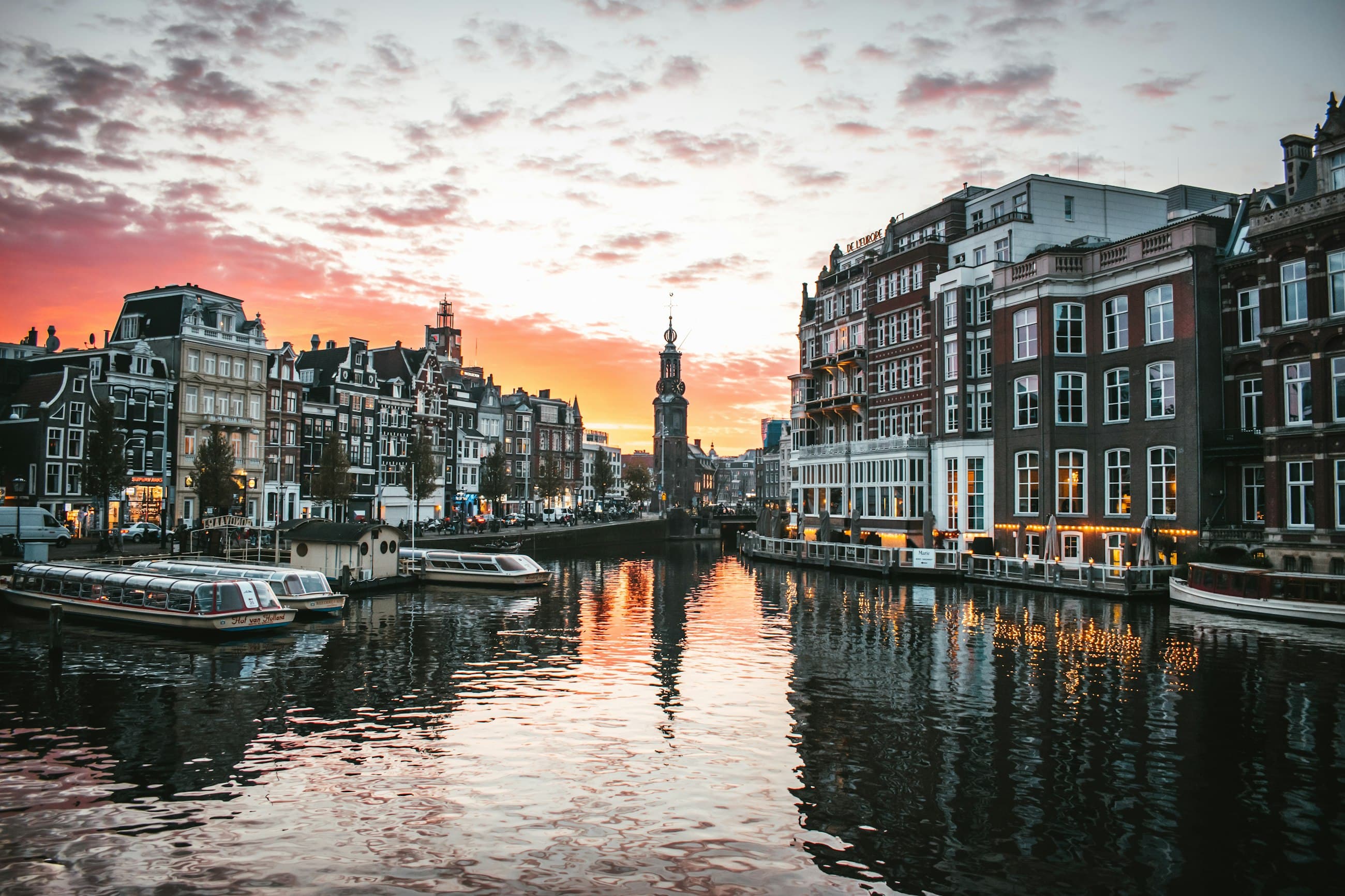 Amsterdam canal at sunset near the Munttoren — Dexffo headquarters